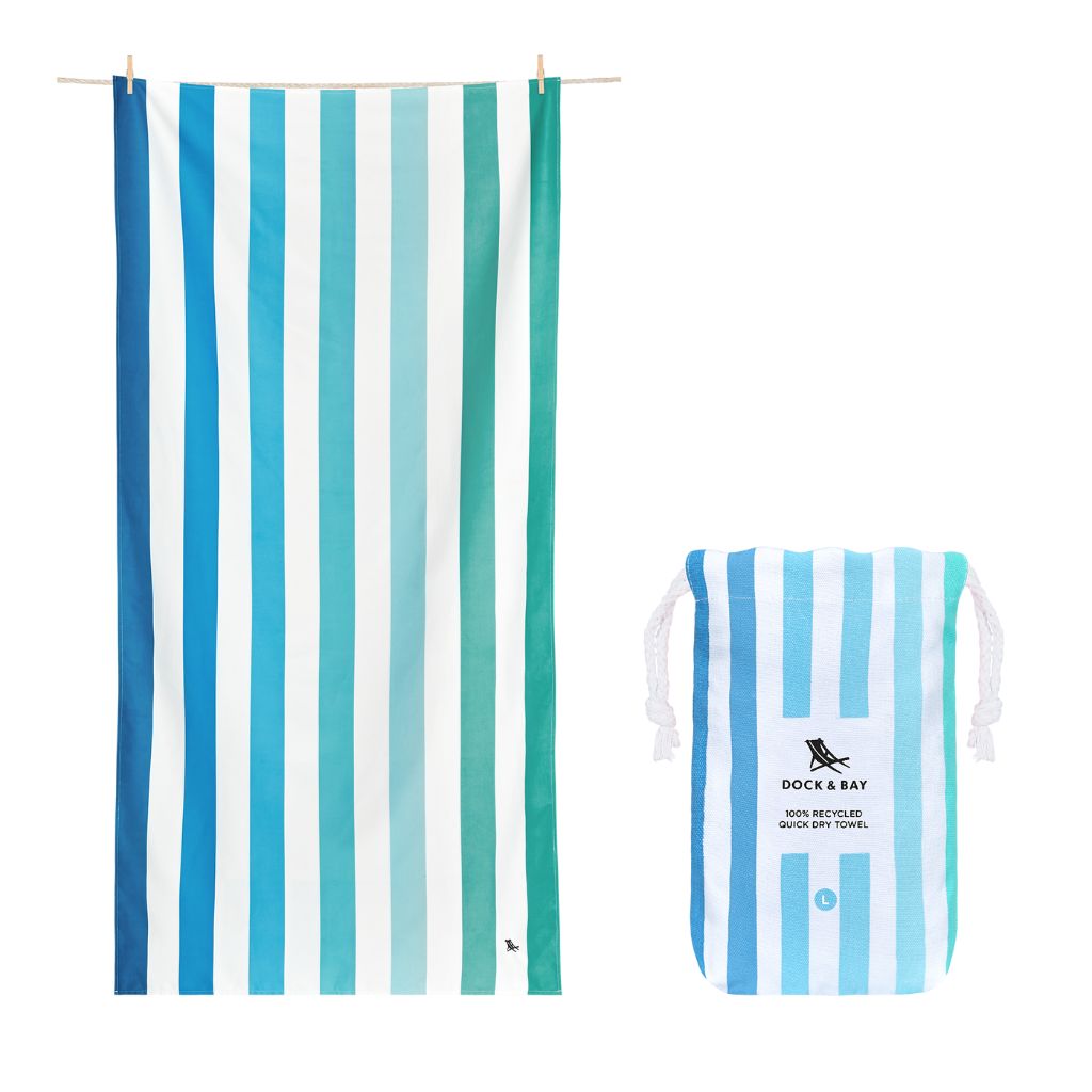 Product shot of Dock and Bay Striped Summer Beach towel and pouch in Endless River