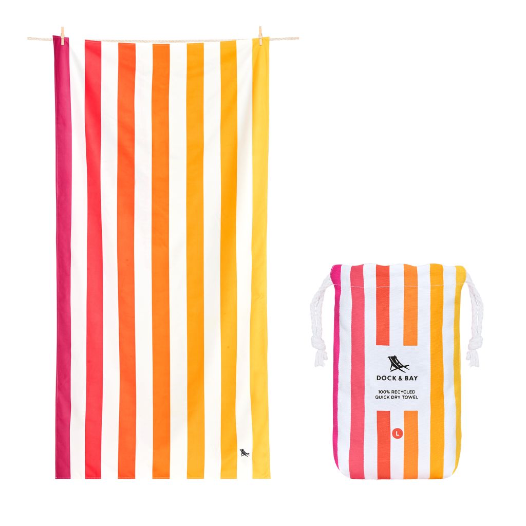 Product shot of Dock and Bay Striped Summer Beach towel and pouch in Peach Sunrise