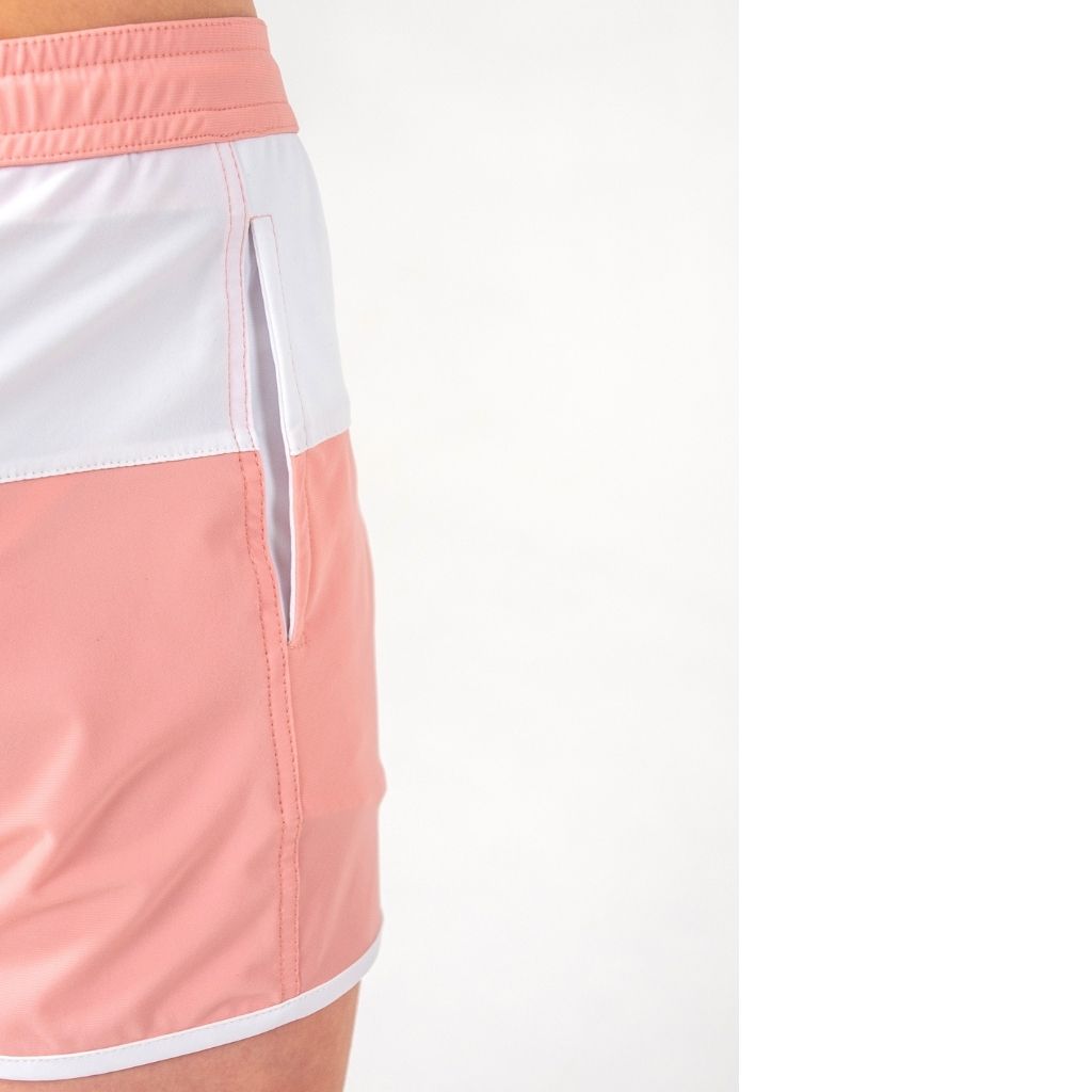 Close up of the pocket on the Folpetto Jack swim shorts in dusty pink and ivory