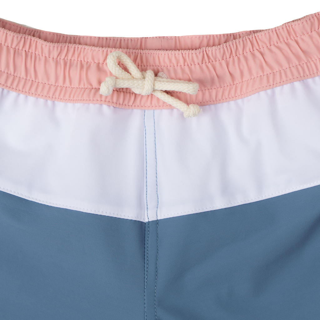 Close up of Folpetto Harry swim shorts for boys in blue and pink