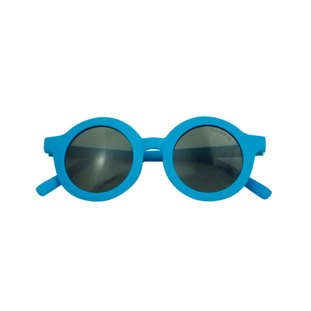 Product shot of Grech and Co sustainable round sunglasses in Azure 