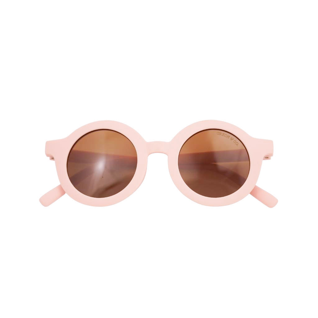 Product shot of Grech and Co sustainable round sunglasses in Blush Bloom 