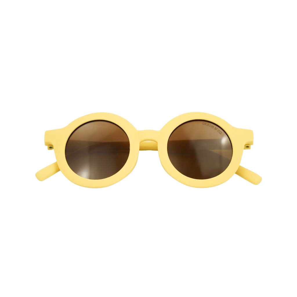 Product shot of Grech and Co sustainable round sunglasses in Mellow Yellow