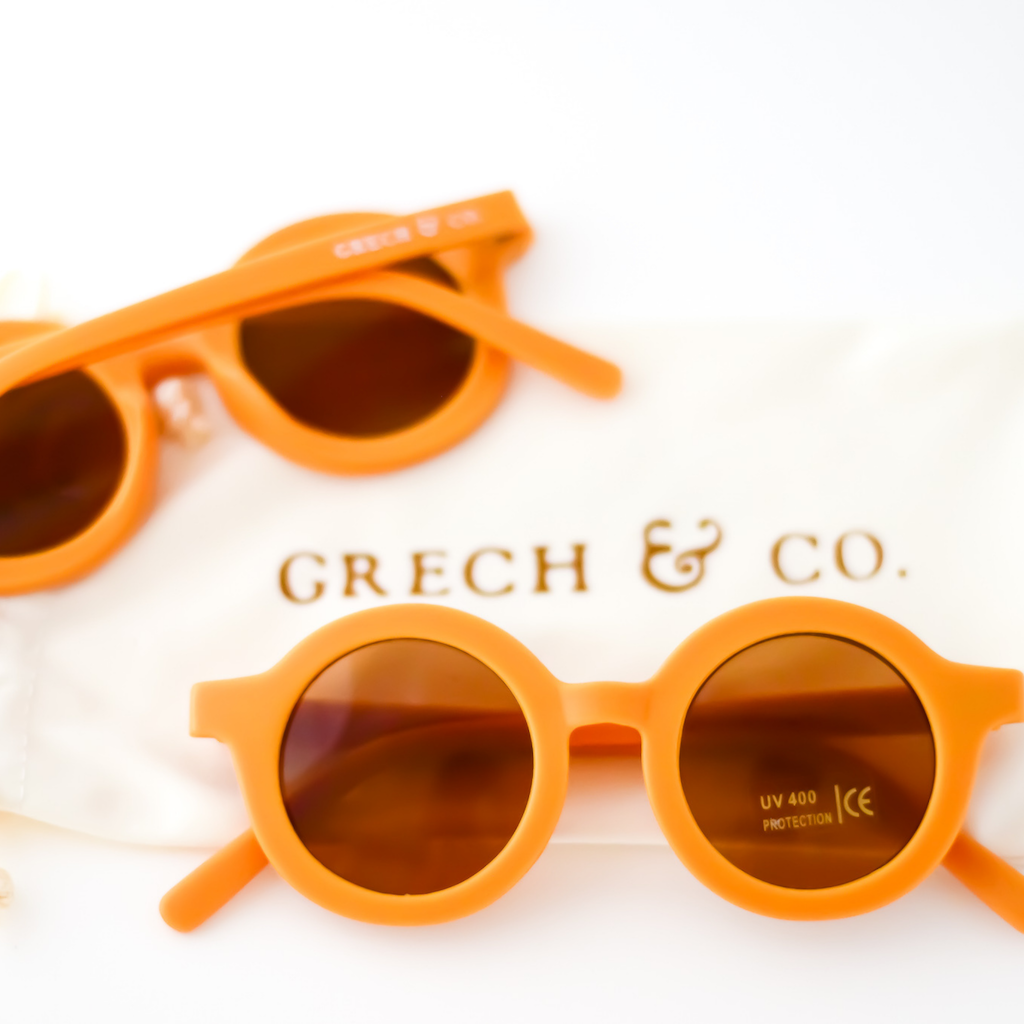 Grech & Co children's sunglasses in golden orange with uv400 protection