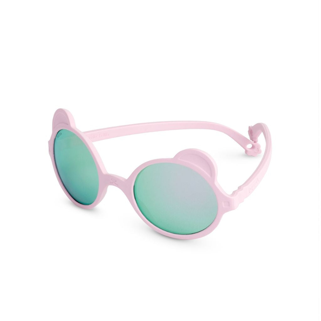 Side view of Ki et La children's Ours'on teddy bear sunglasses in light pink