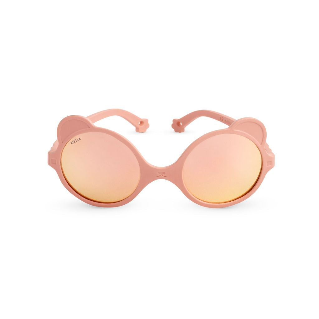 Front view of Ki et La children's Ours'on teddy bear sunglasses in peach pink