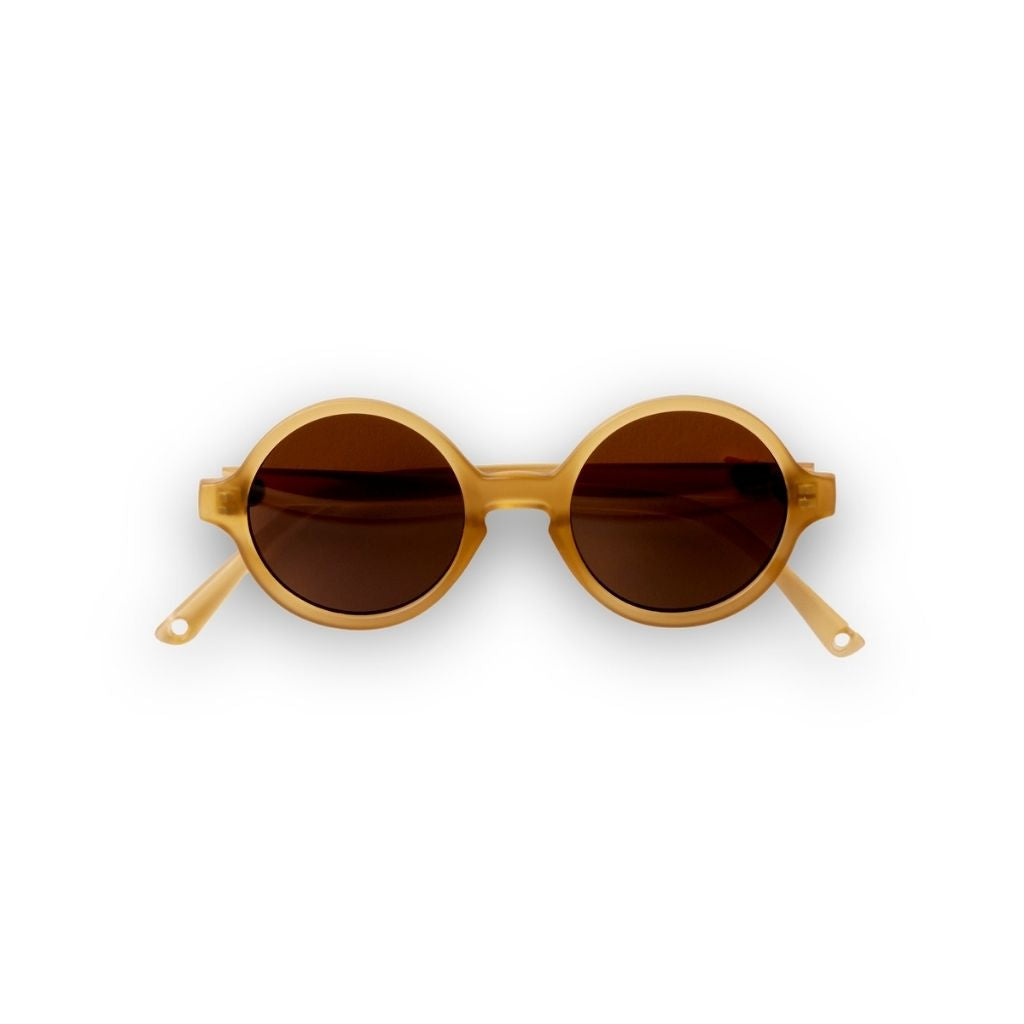 Front view of Ki et La Woam round sunglasses in Brown