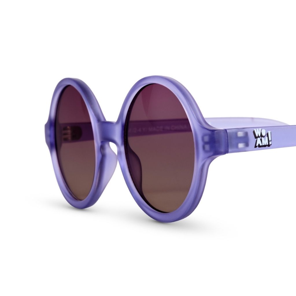 Close up of Ki et La Woam round sunglasses in Purple