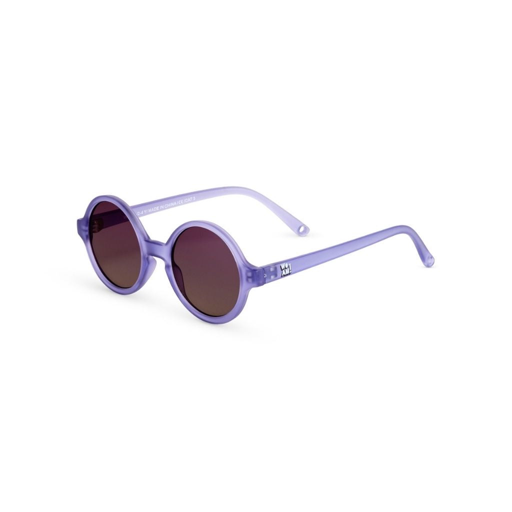 Side view of Ki et La Woam round sunglasses in Purple