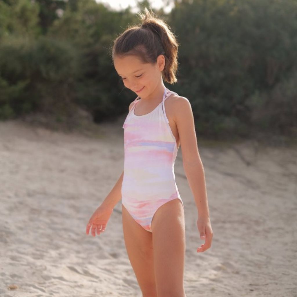 Little girl wearing the Lison Paris Moorea pastel swimsuit