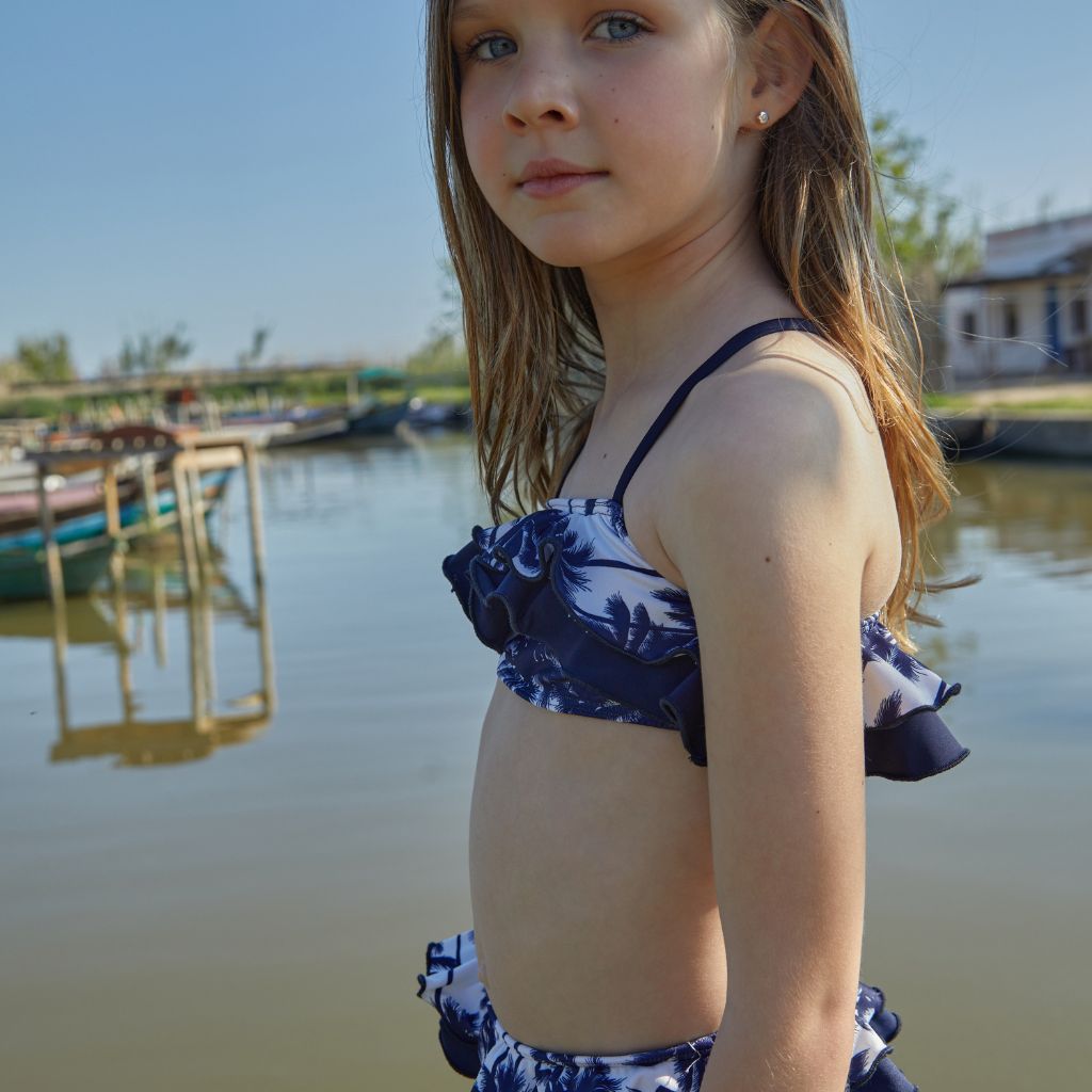 Little girl wearing Suncracy Palms Menorca Cross Two Pieces Girls Bikini