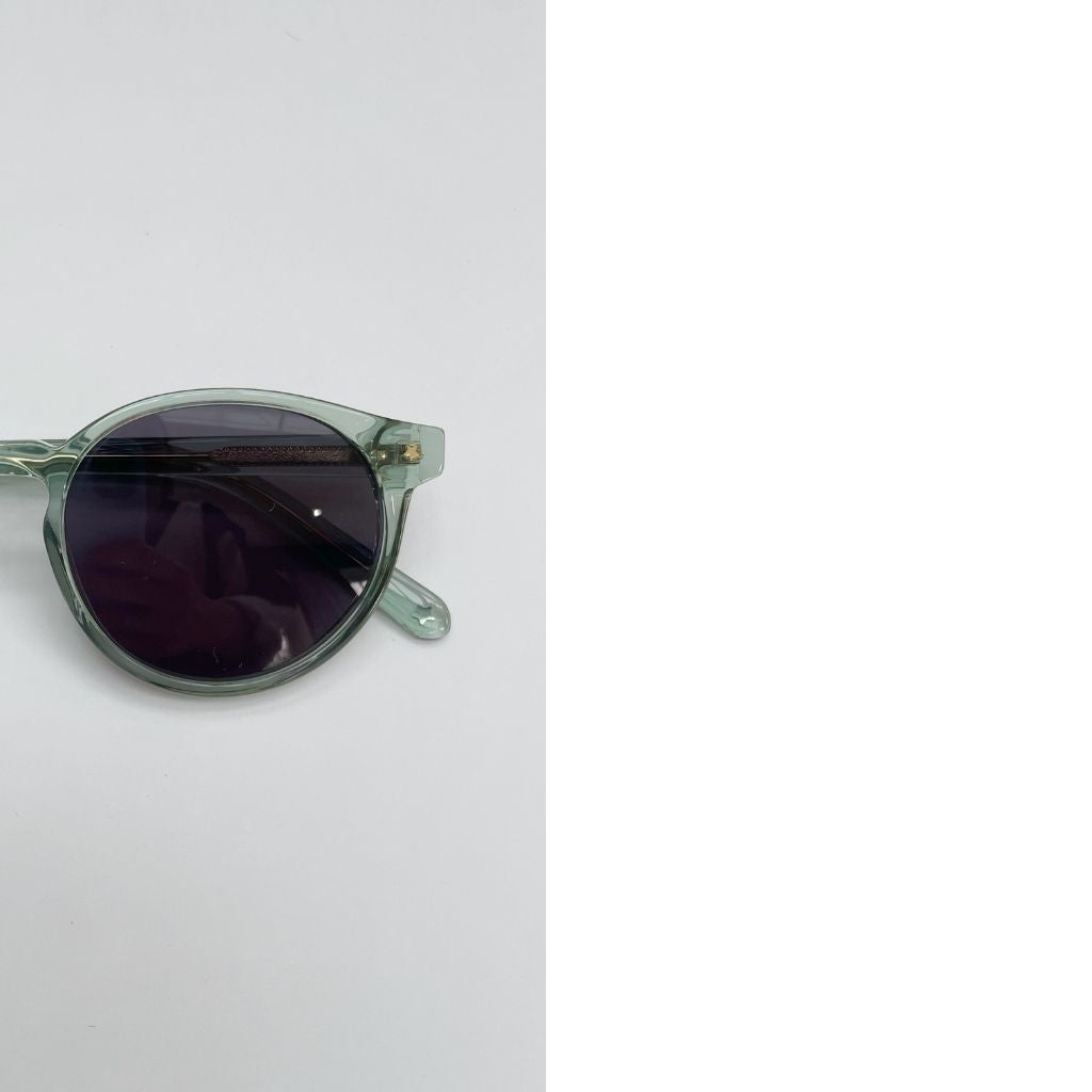 Close up of Maison Juli Fabi Round Sunglasses in Green