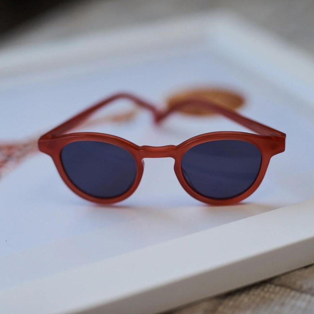 Product shot of Maison Juli Julo sunglasses in orange