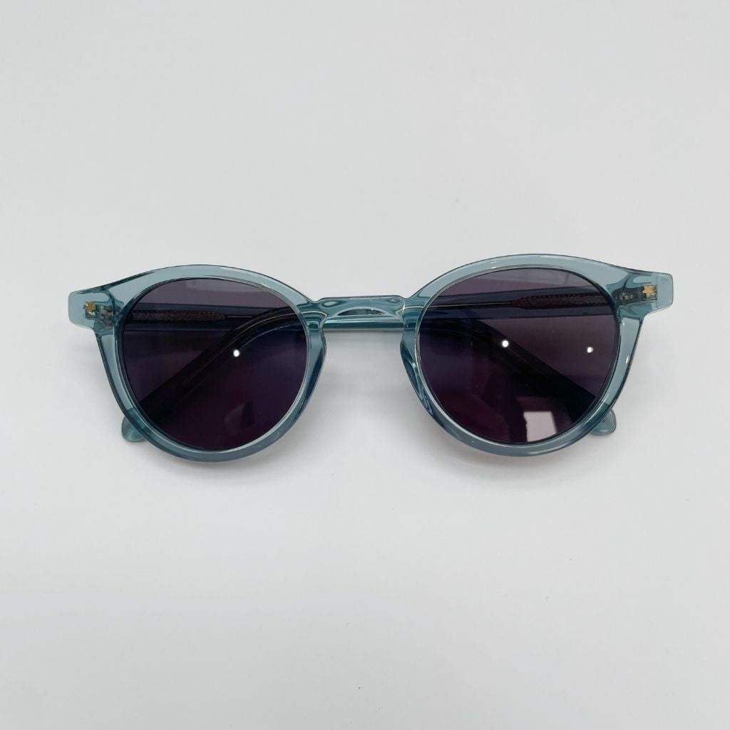 Product shot of Maison Juli Julo Round sunglasses in blue
