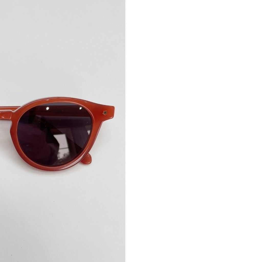Close up of Maison Juli Julo Round sunglasses in orange