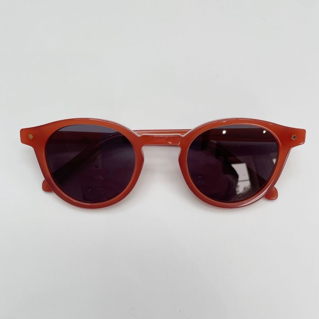 Product shot of Maison Juli Julo Round sunglasses in orange