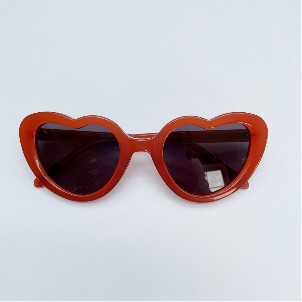 Product shot of Maison Juli girl's Margot orange heart sunglasses