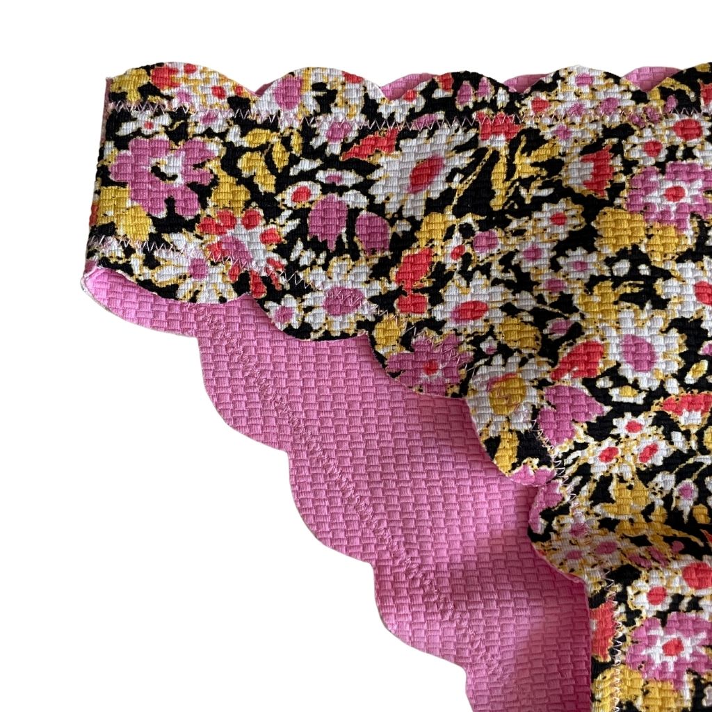 Close up of Marysia Bumby Reversible Bikini Bottoms in Blossom Flower and Blossom Pink Print