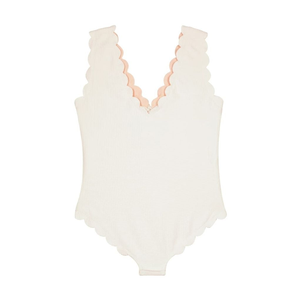 Back of Marysia Bumby Palm Springs lace-up reversible swimsuit in coconut and peach 