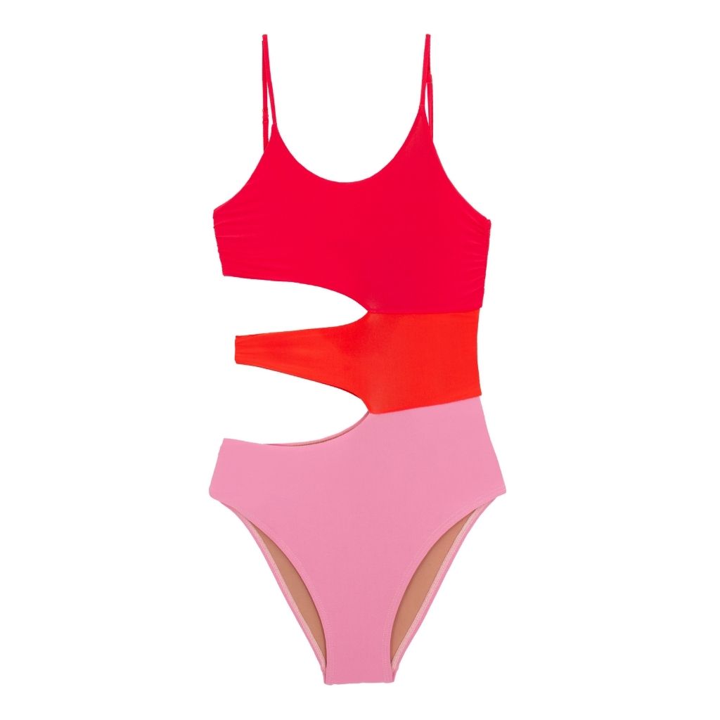 Flatlay of front of PQSwim children's Ava cut-out swimsuit in pink, orange and red