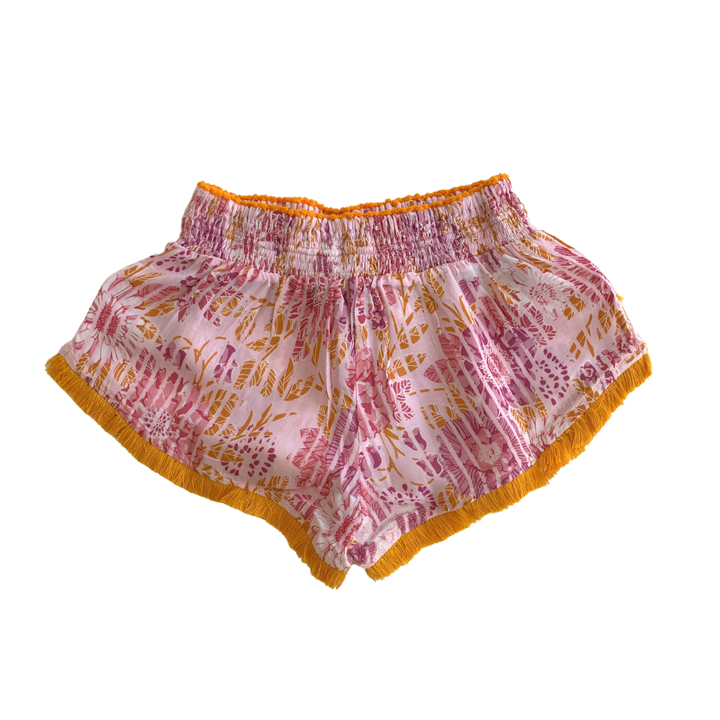 Back of Poupette St Barth Children's Lulu Lace Trimmed Boxer Shorts in Pink Marigold print