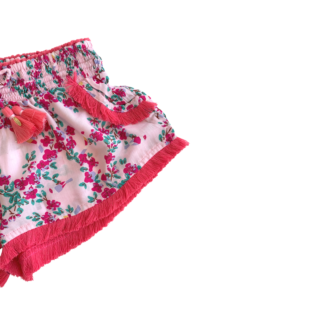 Fringing detail on Poupette St Barth Children's Lulu Lace Trimmed Boxer Shorts in Pink Kookoo Bird print