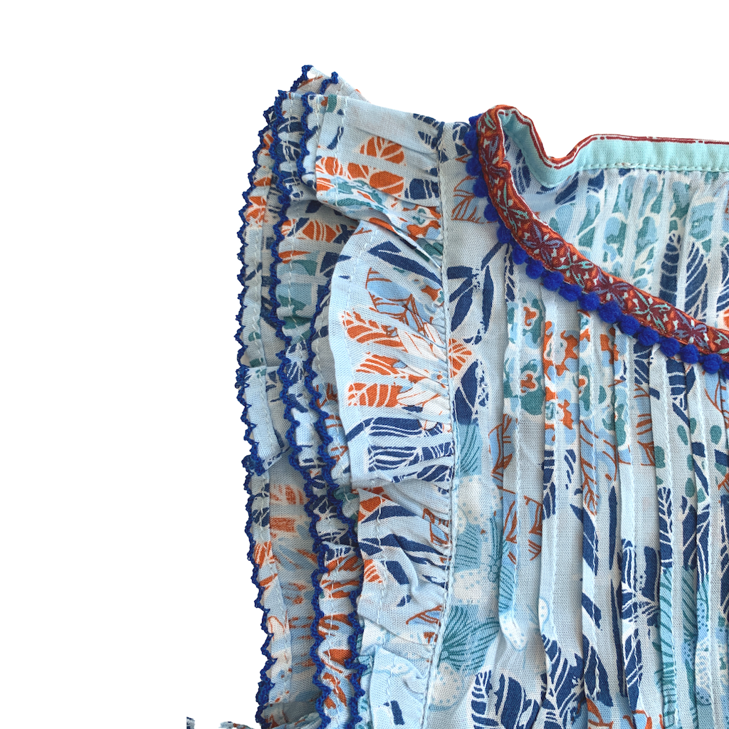 Flutter sleeve detail on Poupette St Barth Children's Amber Pleated Top Blouse in Sky Blue Marigold