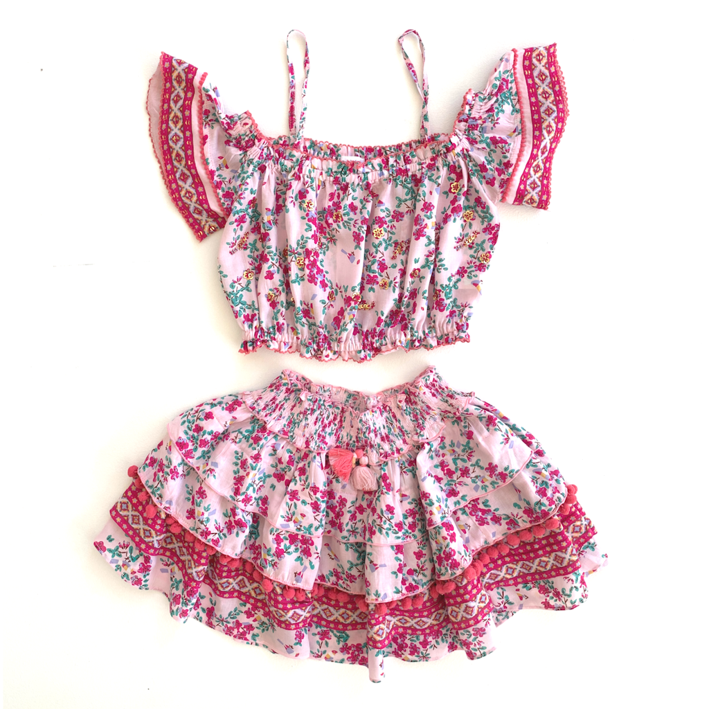 Poupette St Barth matching children's Donna blouse top and Ariel ruffled mini skirt in pink kookoo bird print