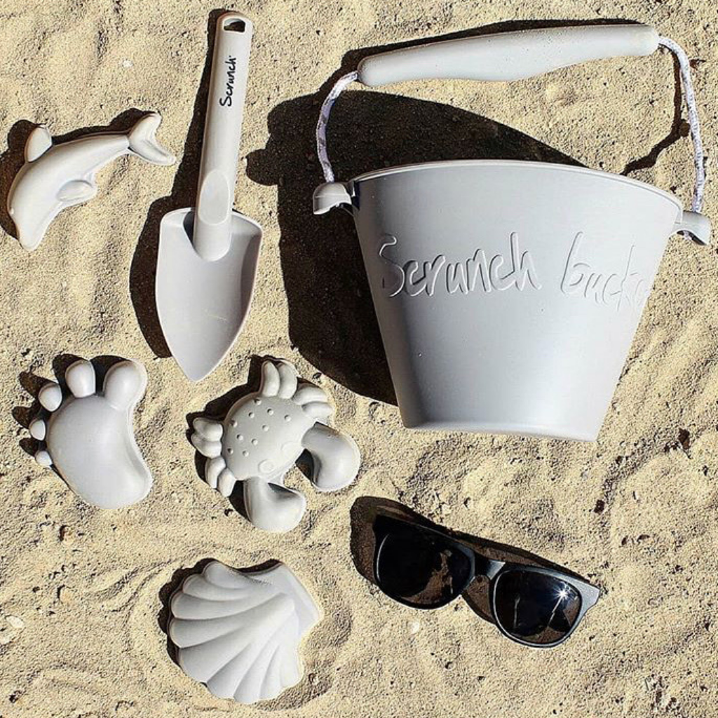 Scrunch collection of beach accessories in mushroom including silicone bucket, space and sand moulds