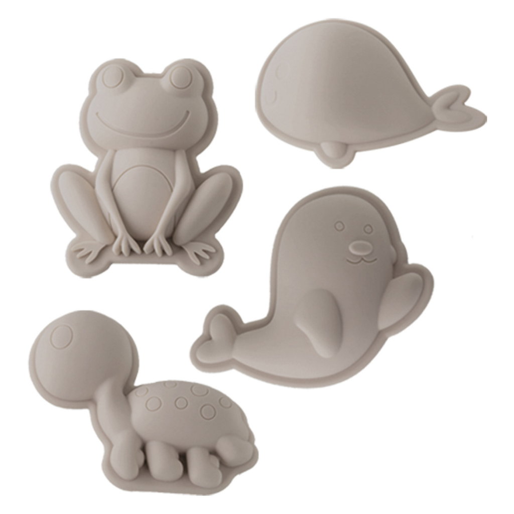 Scrunch silicone sand moulds in the frog set featuring frog, whale, seal and turtle in mushroom