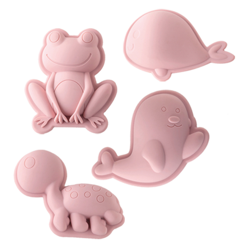 Scrunch silicone sand moulds in the frog set featuring frog, whale, seal and turtle in old rose