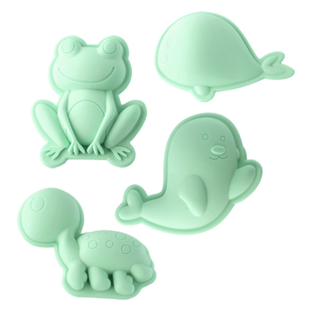 Scrunch silicone sand moulds in the frog set featuring frog, whale, seal and turtle in spearmint