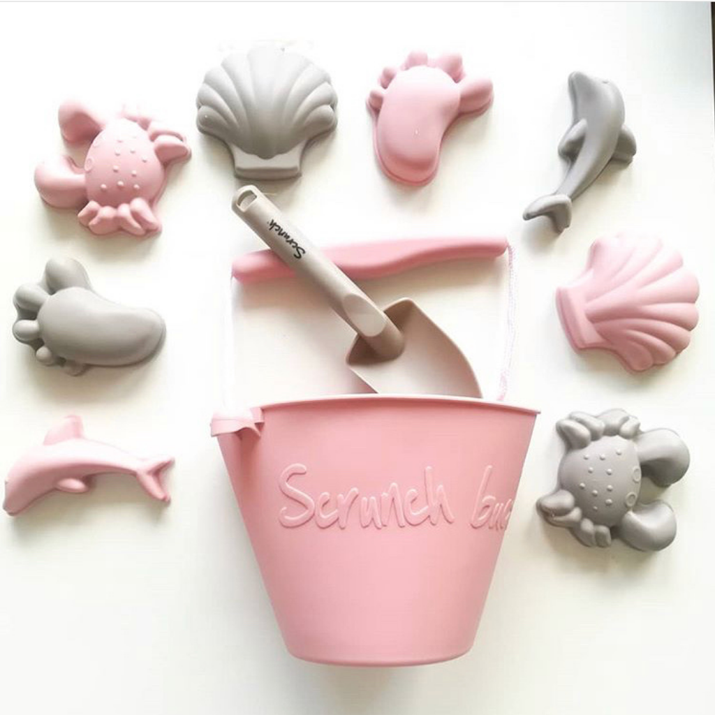Scrunch silicone bucket in old rose with mushroom and old rose footprint set silicone sand moulds
