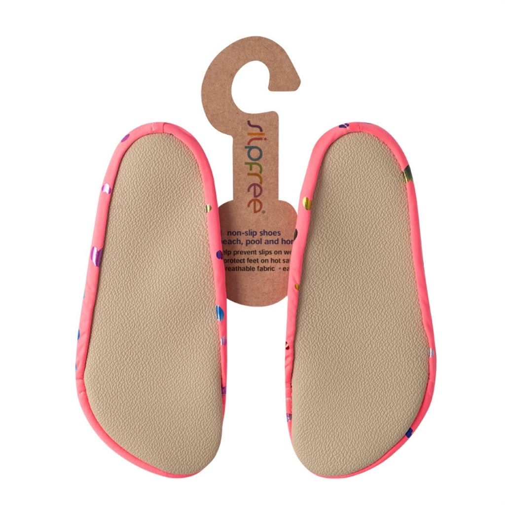 Sole view of the Betty pink non-slip children's shoe from Slipfree in a metallic multicoloured heart foil print
