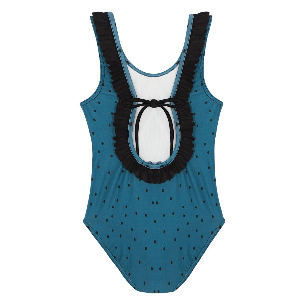 Product shot of the back of the Suncracy Teal Dots Santorini Eight Swimsuit for girls