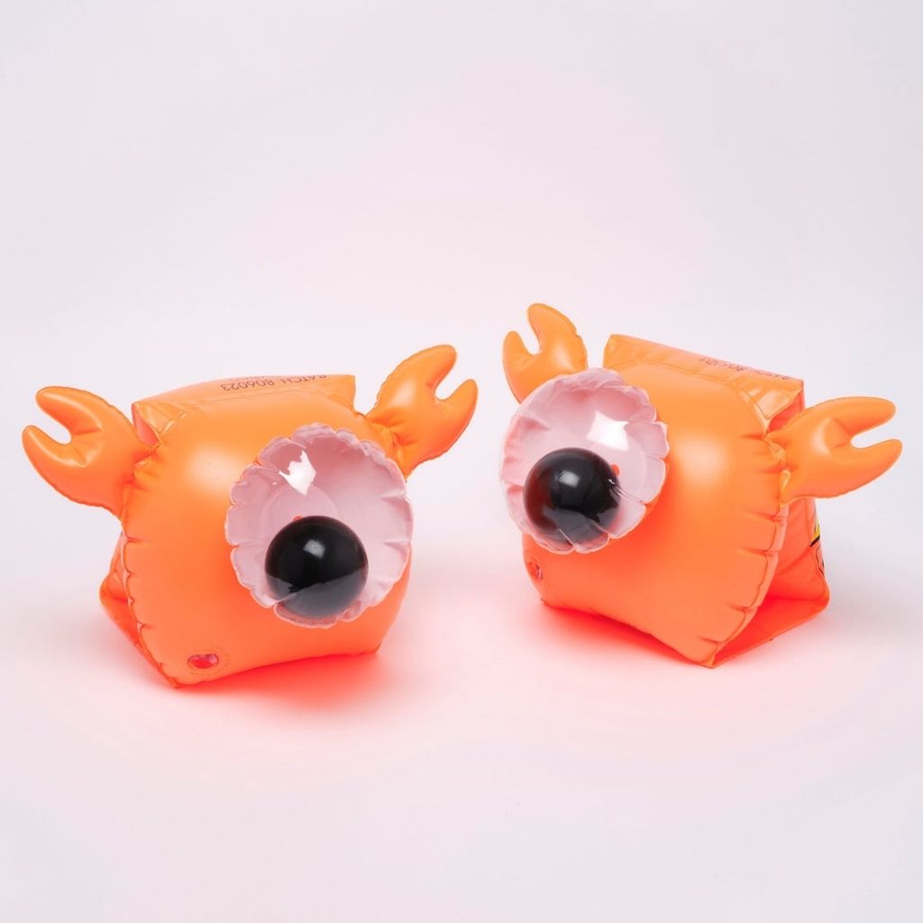 Product shot of Sunnylife kids buddy float bands in sonny the sea creature neon orange