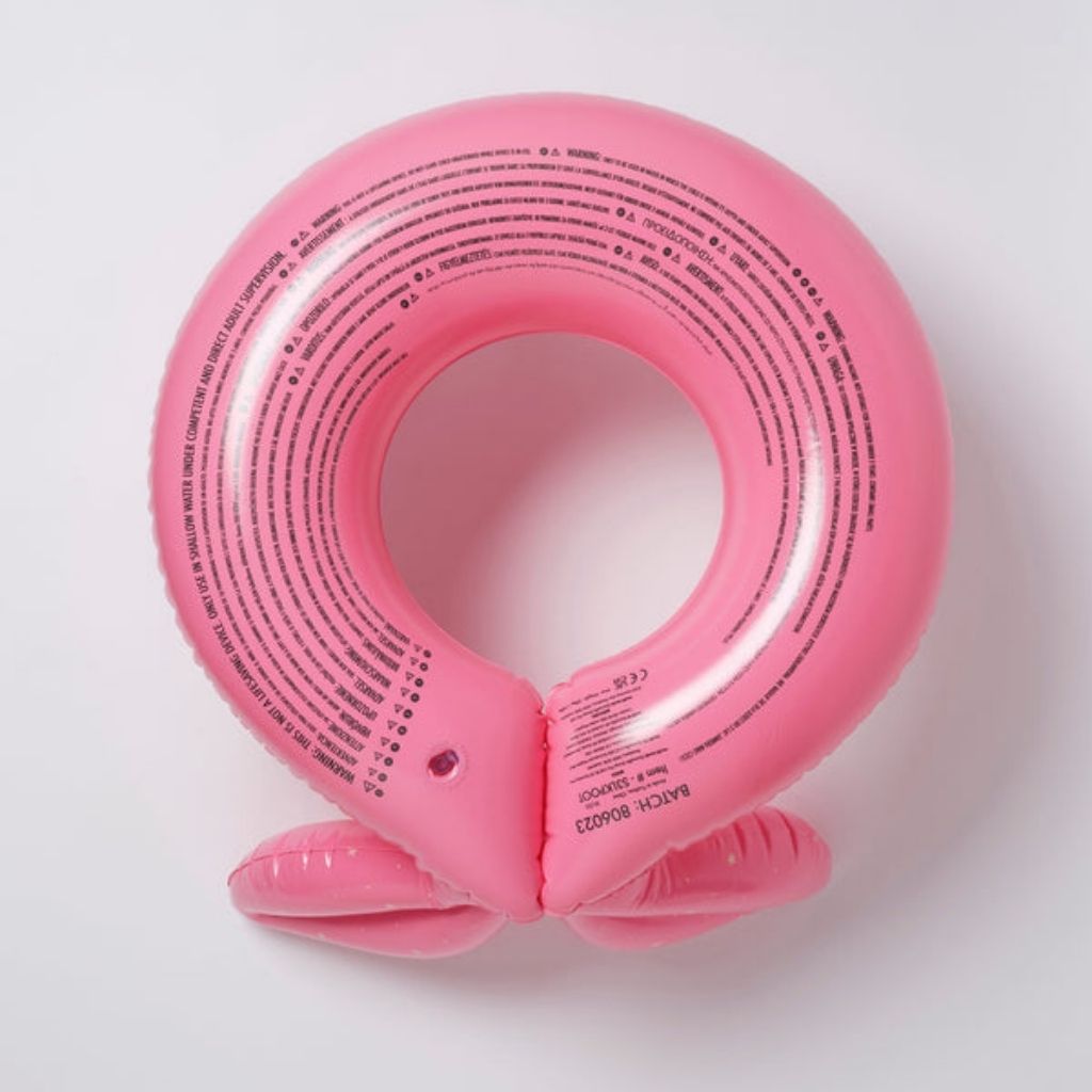 Bottom of the Sunnylife kiddy pool ring in ocean treasure rose showing the safety information