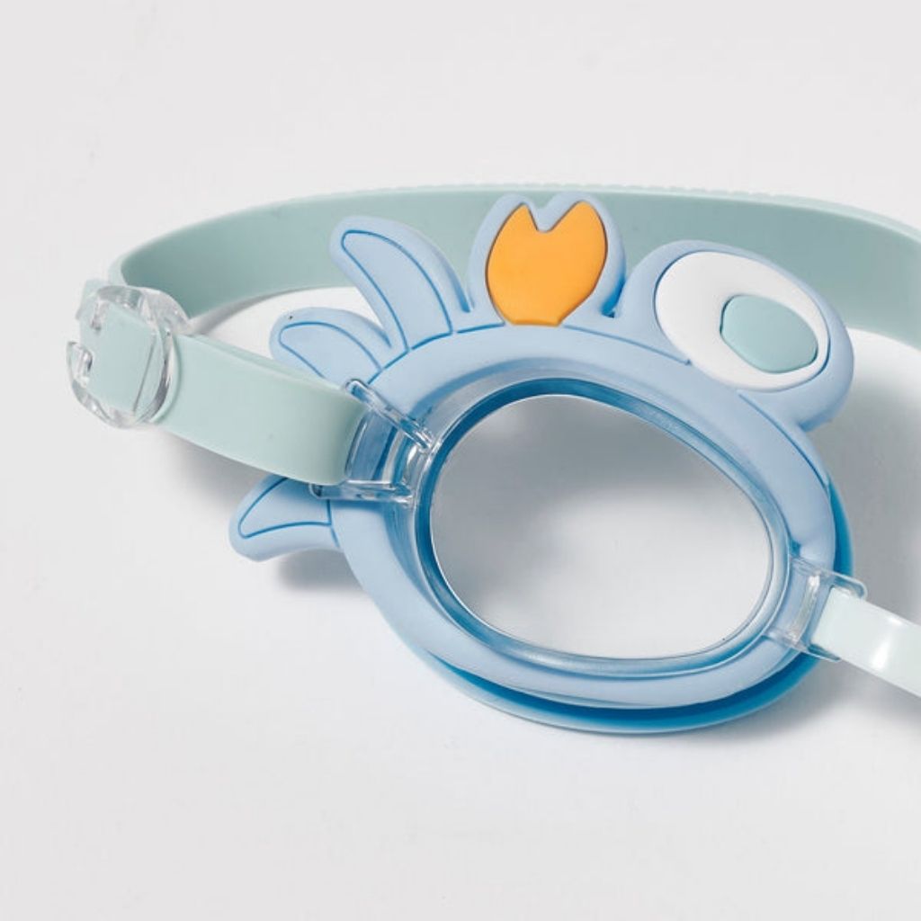 Close up of the rim design on the Sunnylife Kids mini swim goggles in sonny the sea creature neon orange