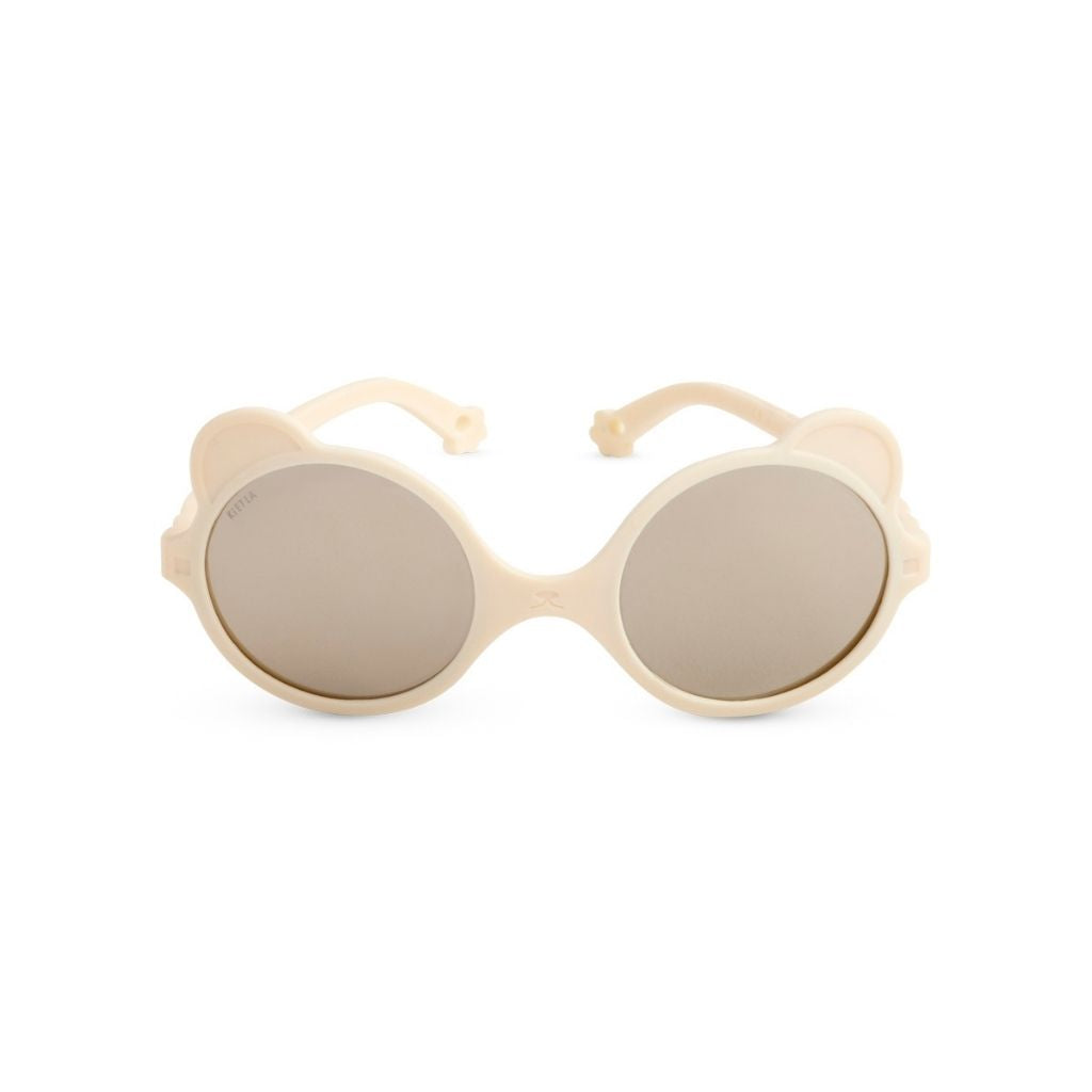 Front view of Ki et La Ours'on baby sunglasses in cream