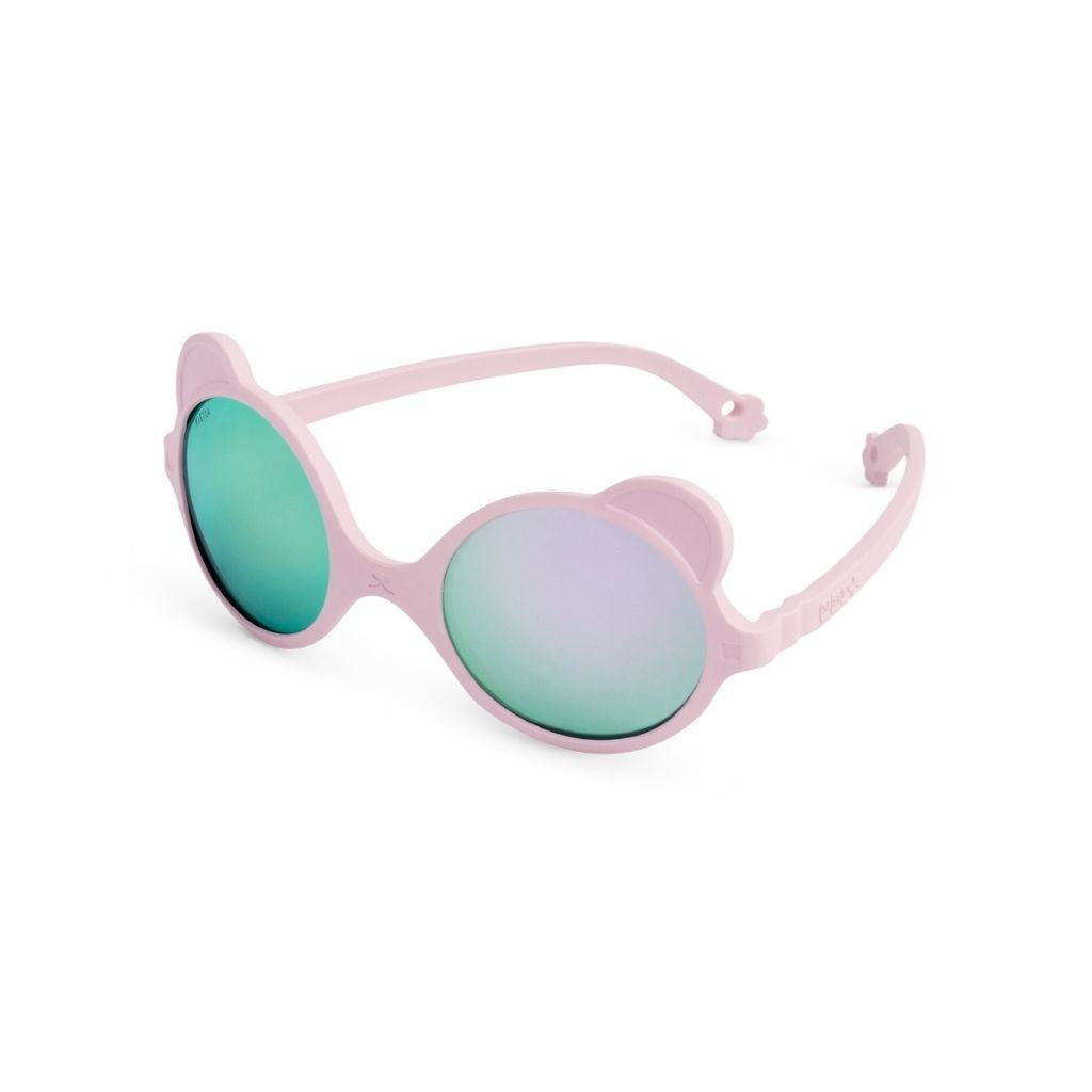 Side view of Ki et La Ours'on baby sunglasses in light pink