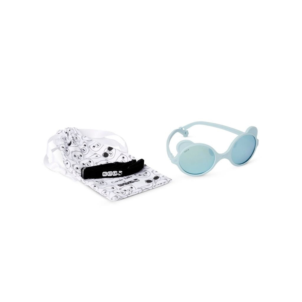 Pouch and strap and Ki et La Ours'on baby sunglasses in in sky blue